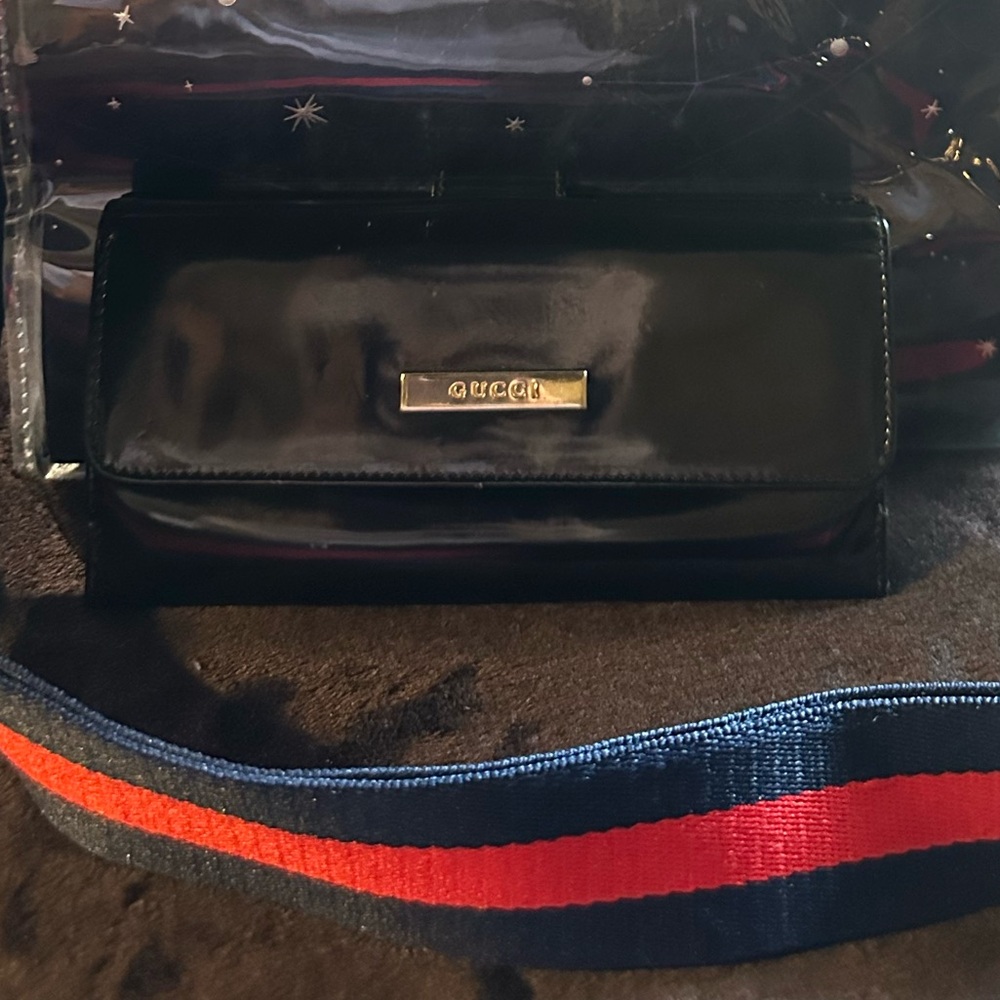 Gucci Black wallet with Gold Accents